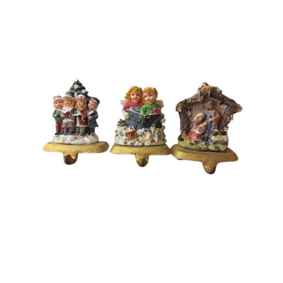 Set Of 3 Holiday Stocking Holders With Carolers Angels & Nativity Scene Resin Fi - Picture 1 of 10